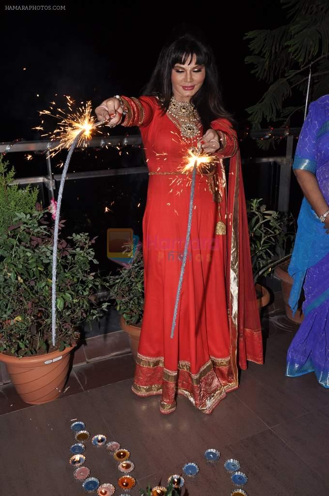 Rakhi Sawant celeberates Diwali with family in Andheri, Mumbai on 11th Nov 2012