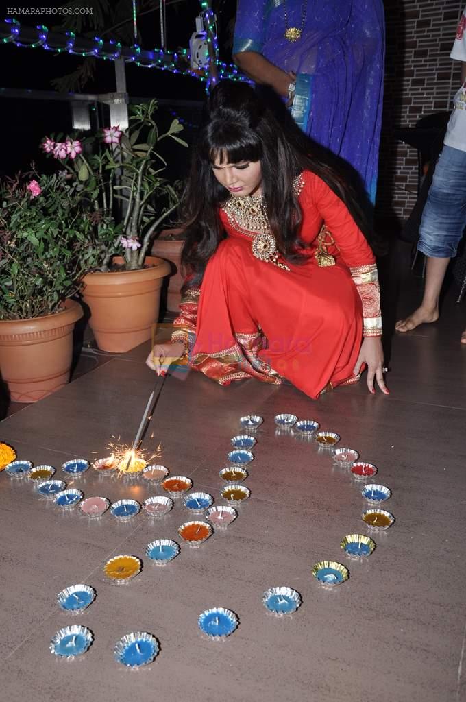 Rakhi Sawant celeberates Diwali with family in Andheri, Mumbai on 11th Nov 2012
