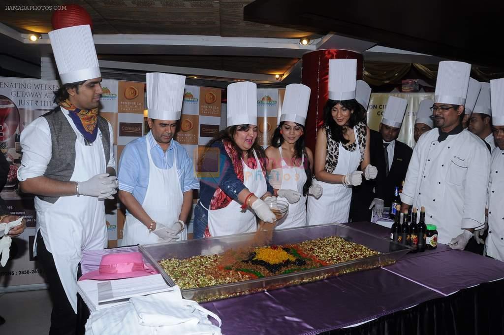 Dolly Bindra at Peninsula Grand cake mixing event in Andheri, Mumbai on 26th Nov 2012