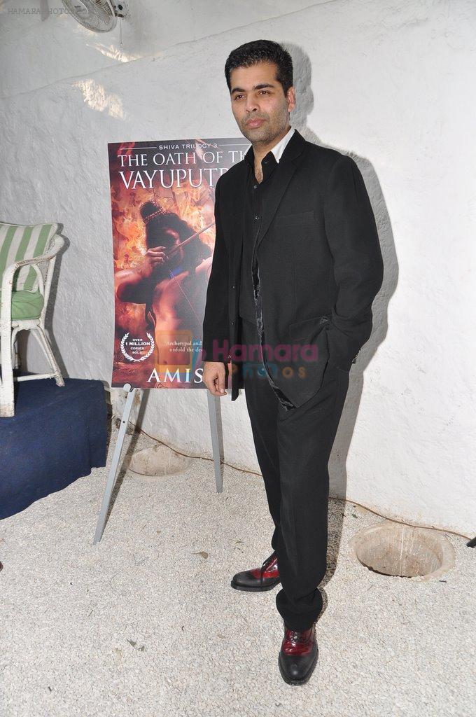 Karan Johar launches the Cover of Amish's eagerly anticipated 3rd book in the Shiva Trilogy, The Oath of the Vayuputras in Mumbai on 27th Dec 2012