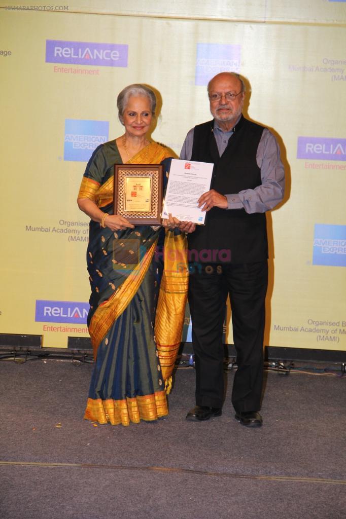 Waheeda Rehman  receiving the Lifetime Achievement Award by Shyam Benegal at the Award Night at 14th MFF