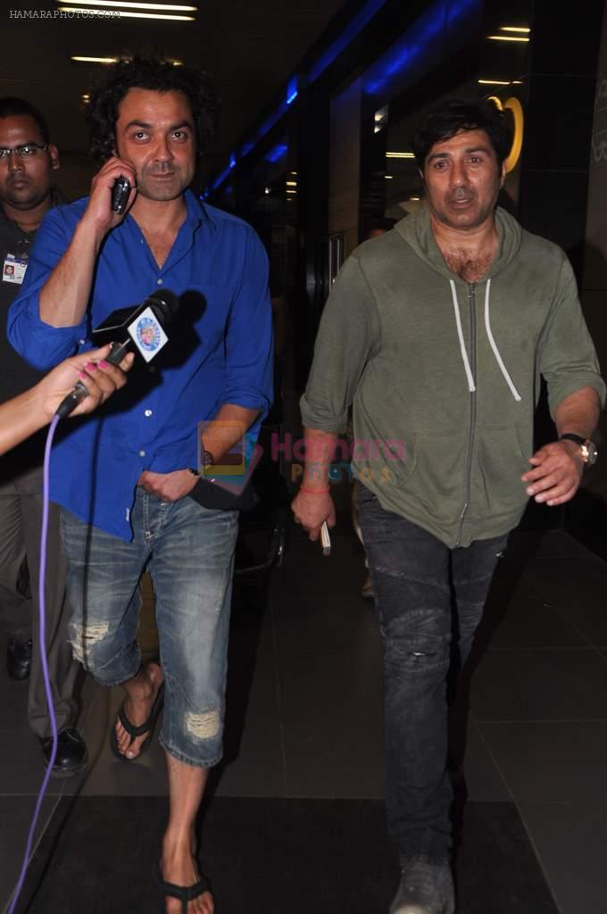 Sunny Deol and Bobby Deol snapped at the airport returning from bangkok after shoot in Mumbai on 13th March 2013
