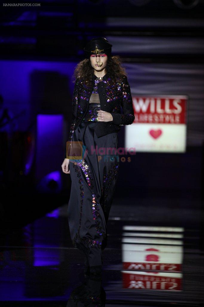 Model walks the ramp for Manish Arora Show Garnd Finale at Wills Lifestyle India Fashion Week 2013 Day 5 in Mumbai on 17th March