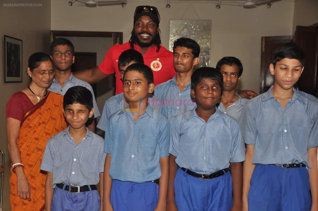 Chris Gayle spend time with NGO kids in Worli, Mumbai on 26th April 2013