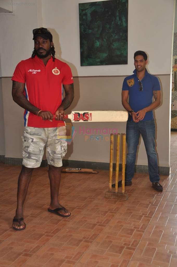 Chris Gayle and Siddharth Mallya spend time with NGO kids in Worli, Mumbai on 26th April 2013