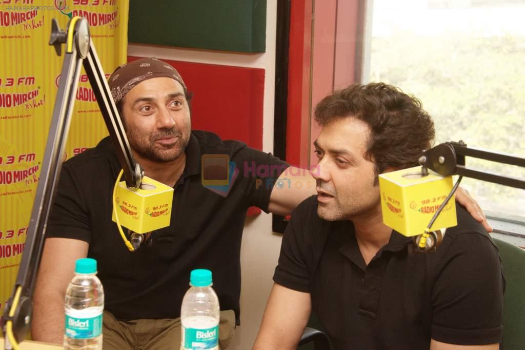 Sunny Deol, Bobby Deol at Radio Mirchi studio for the promotion of Yamla Pagla Deewana 2 in Lower Parel, Mumbai on 16th May 2013