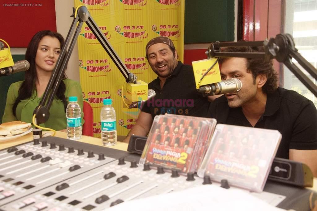 Bobby, Sunny, Kristina Akheeva at Radio Mirchi studio for the promotion of Yamla Pagla Deewana 2 in Lower Parel, Mumbai on 16th May 2013