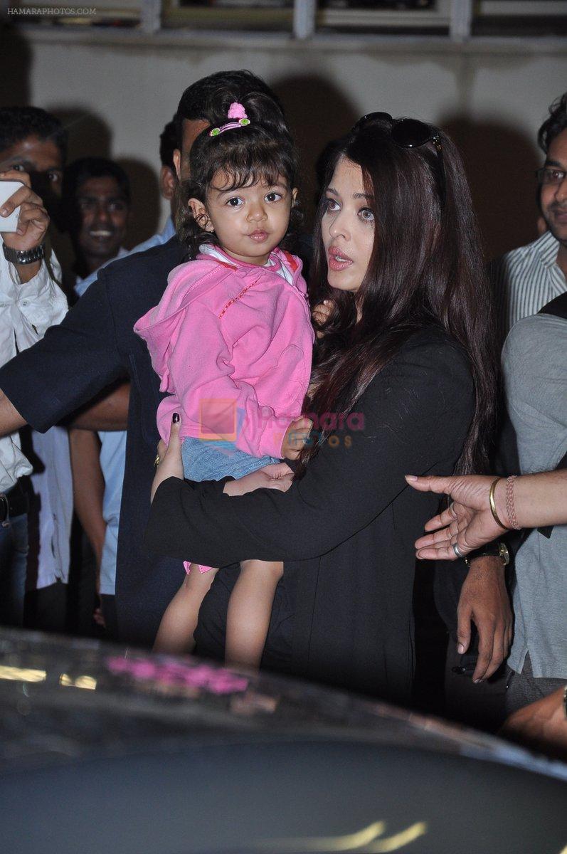 Aishwarya Bachchan with Aaradhya Bachchan as she arrives from London in Mumbai on 26th June 2013