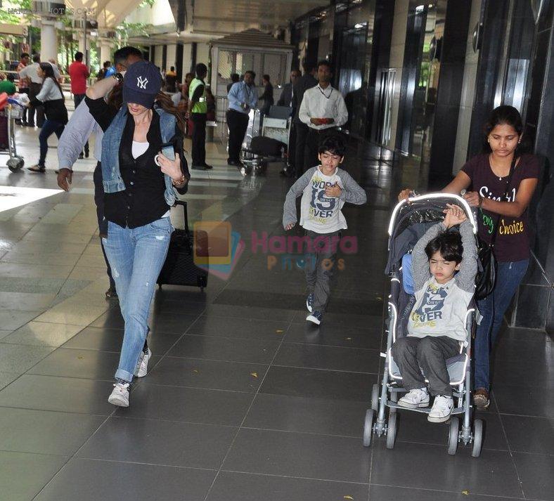 Suzanne Roshan snapped with kids in Mumbai Airport on 7th July 2013