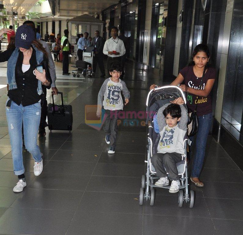 Suzanne Roshan snapped with kids in Mumbai Airport on 7th July 2013