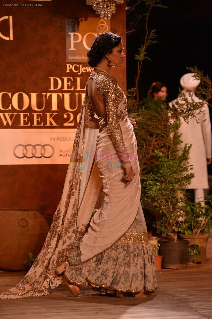 Model walks for Sabyasachi showcases at PCJ Delhi Couture Week, Delhi on 31st July 2013