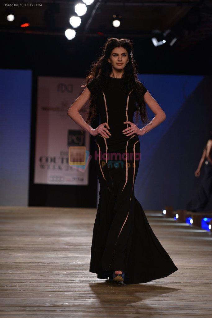 Model walk the ramp for Monisha Jaising showcases on day 2 at PCJ Delhi Couture Week on 1st Aug 2013