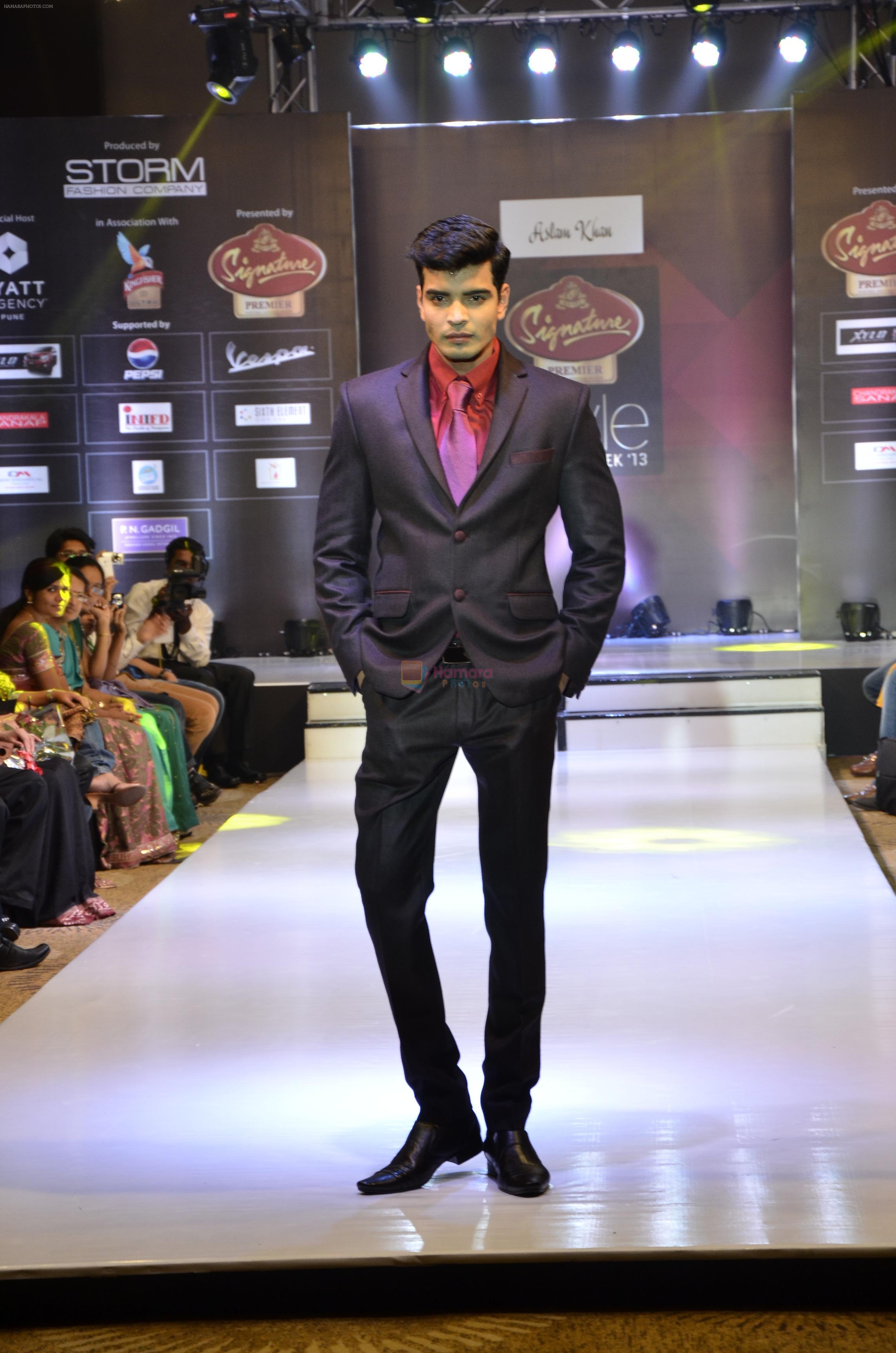 Model flaunts a creation of Aslam Khan at the Signature Premier Pune Style Week 2013.
