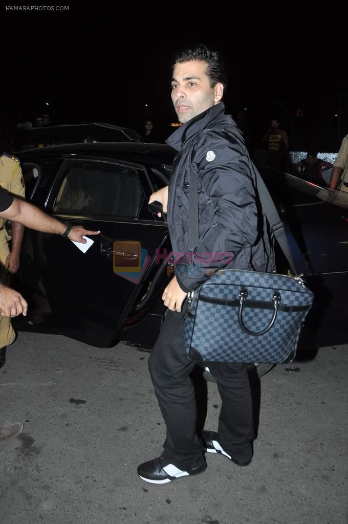 Karan Johar leave for SAIFTA Awards in Mumbai Airport on 4th Sept 2013