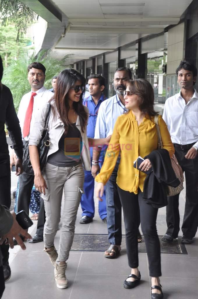 Priyanka Chopra, Madhuri Dixit return from Durban in Mumbai Airport on 8th Sept 2013