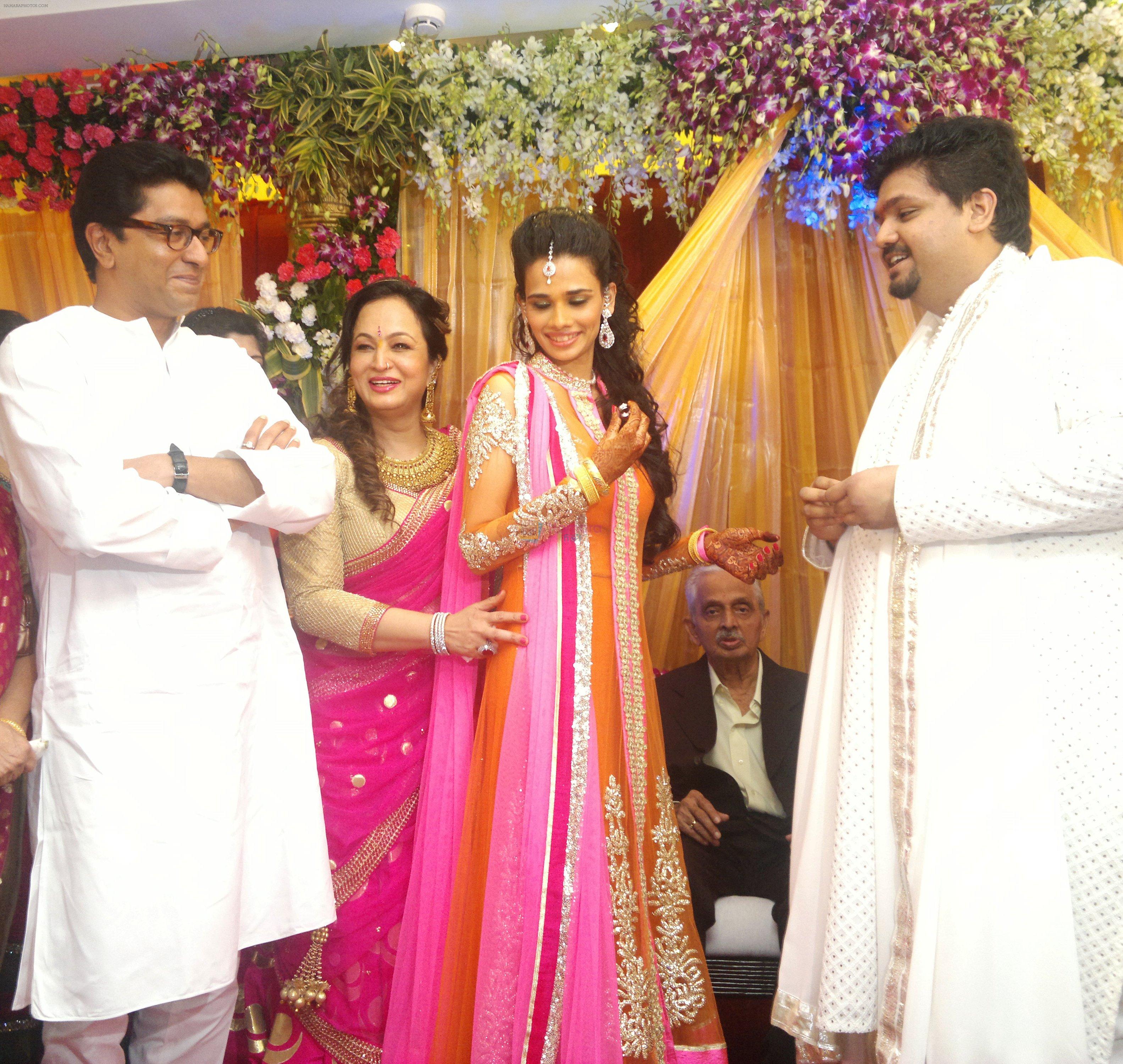 raj thackeray, smita thackeray, aditi redkar and rahul thackray share a moment at the rahul-aditi engagement