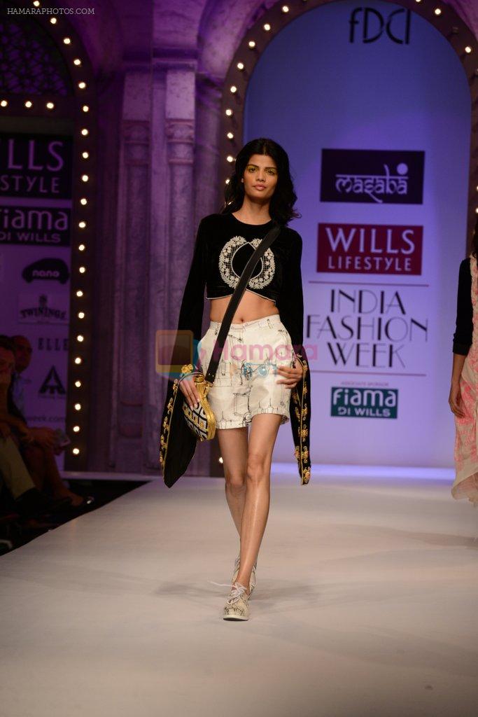 Model walk the ramp for Masaba Gupta's show at the Day 1 on WIFW 2014 on 9th Oct 2013