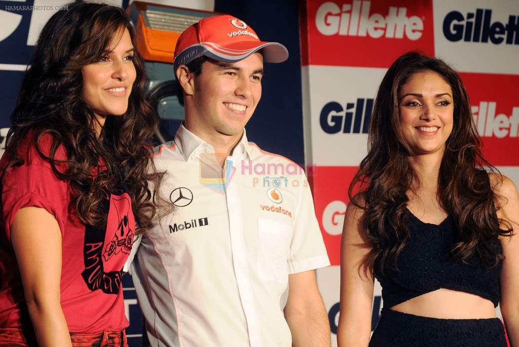 Neha Dhupia, Aditi Rao Hydari, Sergio Perez during a Gillette promotional event in Mumbai on 23rd Oct 2013