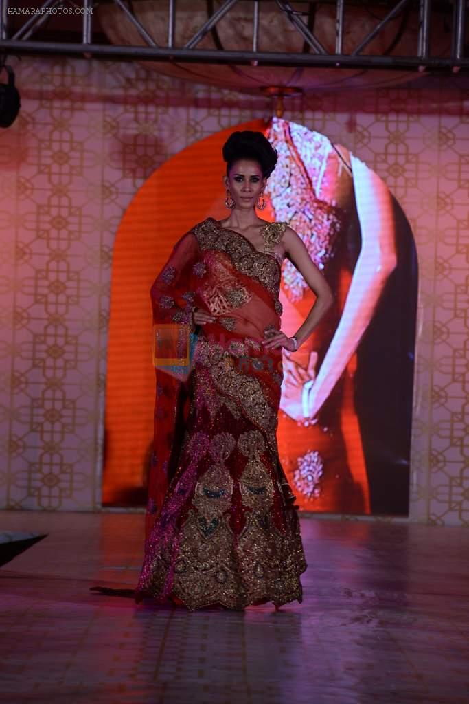 Model walks for Rohit Verma's show for Marigold Watches in J W Marriott, Mumbai on 11th Dec 2013