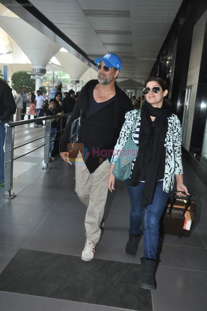 Akshay kumar and Twinkle Khanna snapped at the airport as they arrive from Casablanca on 16th Dec 2013