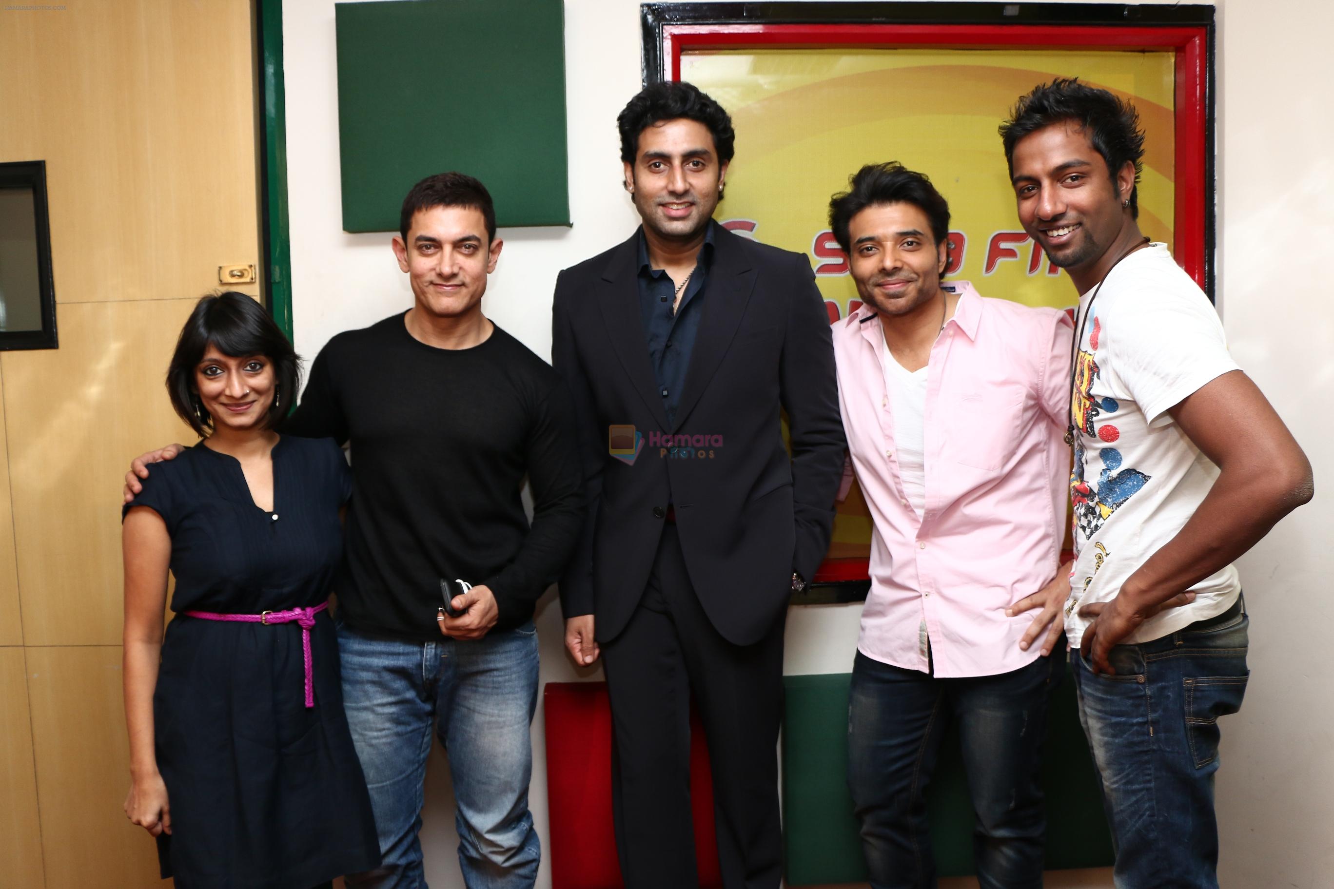 RJ Meera and RJ Suren of Sunset Samosa with Aamir Khan, Abhishekh Bachchan and Uday Chopra at Radio Mirchi studio for promotion of Their upcoming movie Dhoom 3
