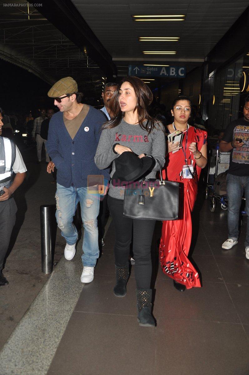 Saif Ali Khan, kareena Kapoor leave for their new years vacation in Mumbai on 25th Dec 2013