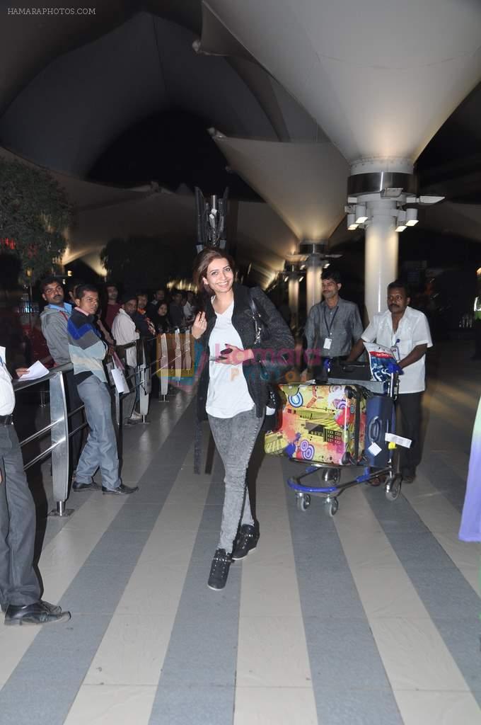 Karishma Tanna snapped at the airport in Mumbai on 5th Jan 2014