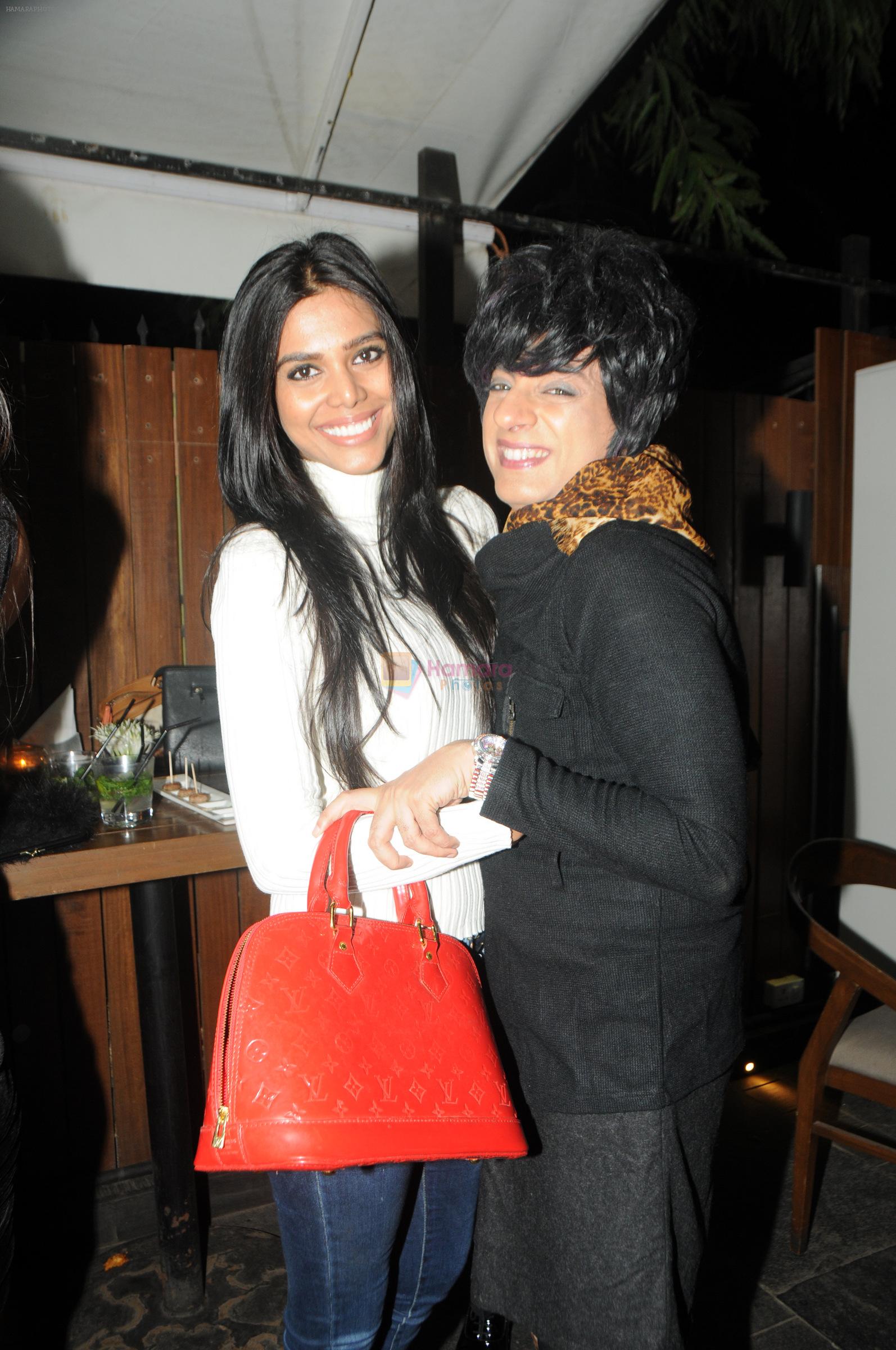 Rohhit Verma with Natasha Suri at Rohhit Verma hosts a surprise party for Prem Sharma in Mumbai on 5th Jan 2014