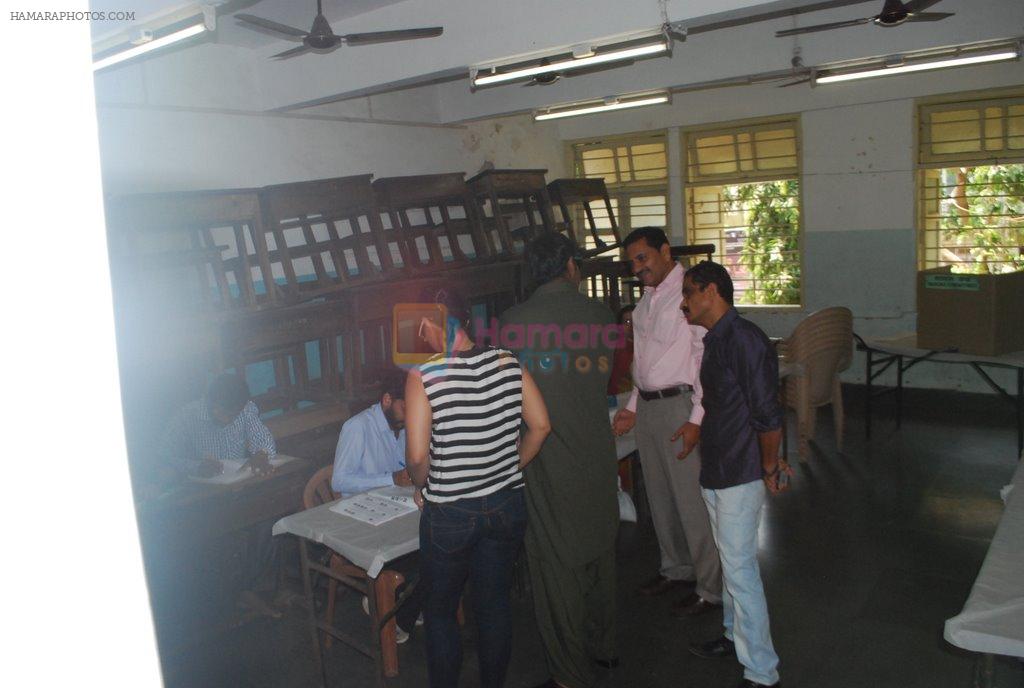Kajol, Ajay Devgan go for voting