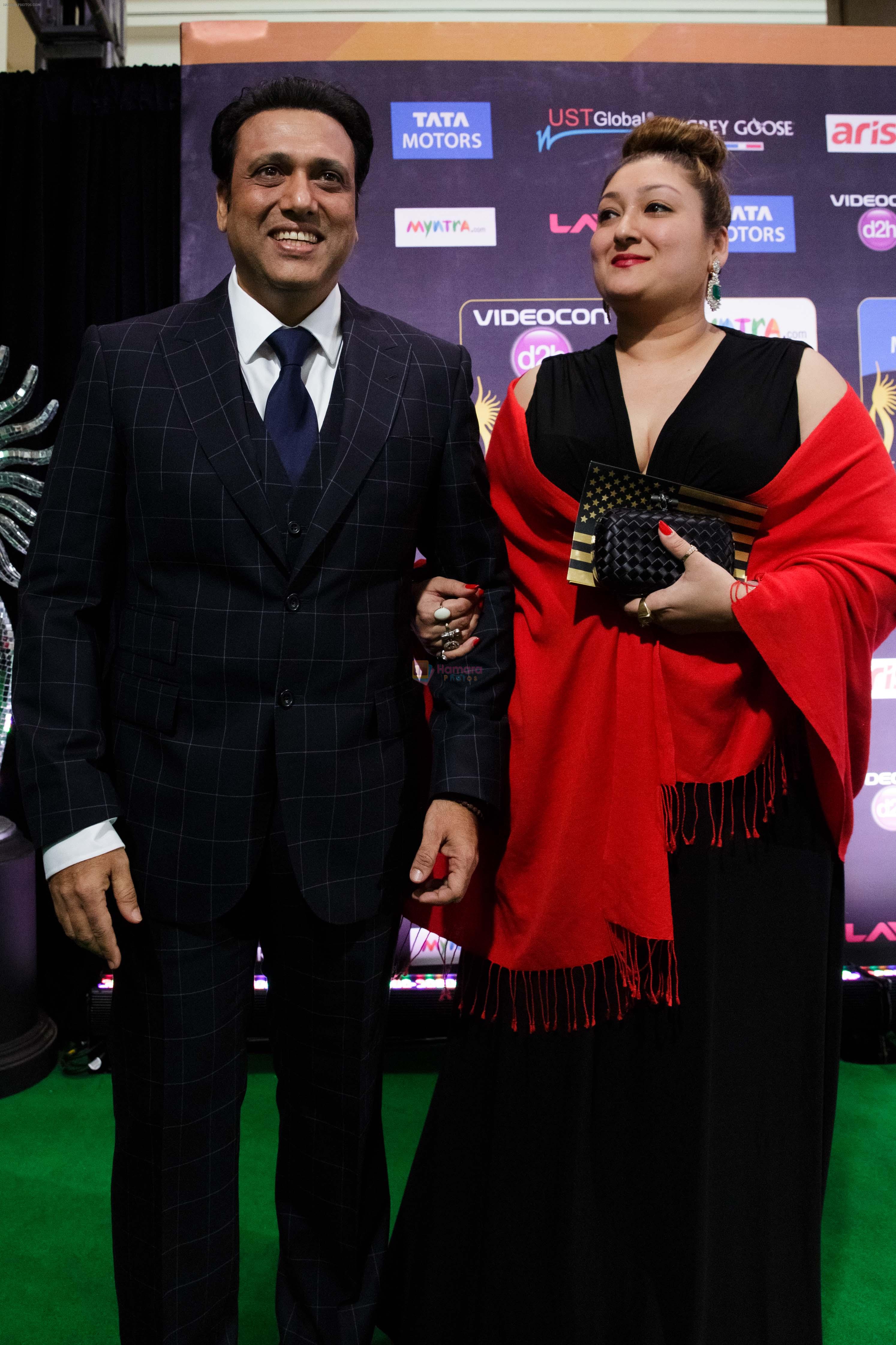 Govinda with wife Sunita at IIFA ROCKS Green Carpet in Tampa Convention Center on 24th April 2014
