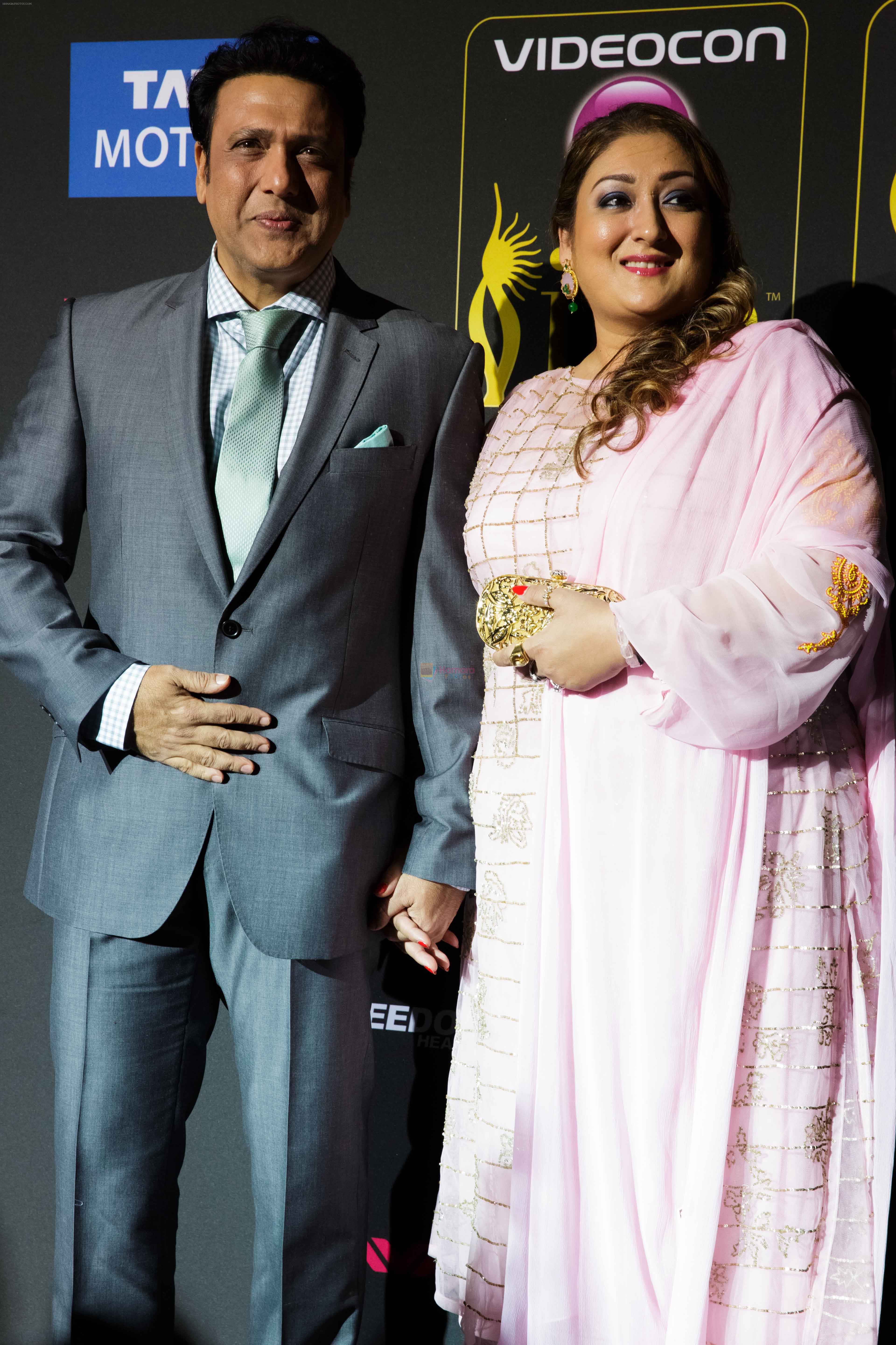 Govinda with wife Sunita at IIFA Magic of the Movies Green Carpet in Mid Florida Credit Union Amphitheater on 25th April 2014