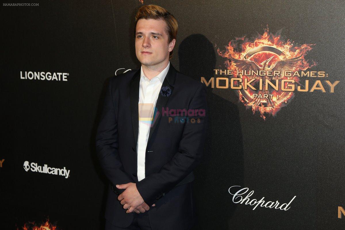 0517_Josh-Hutcherson_at_Hunger-Games_party_with_Chopard