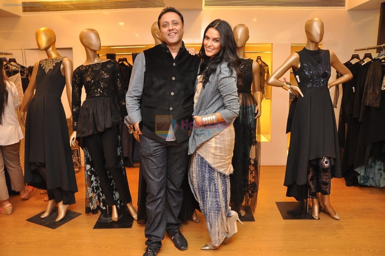 Neha Dhupia  with Varun at his Couture Collection preview at AZA