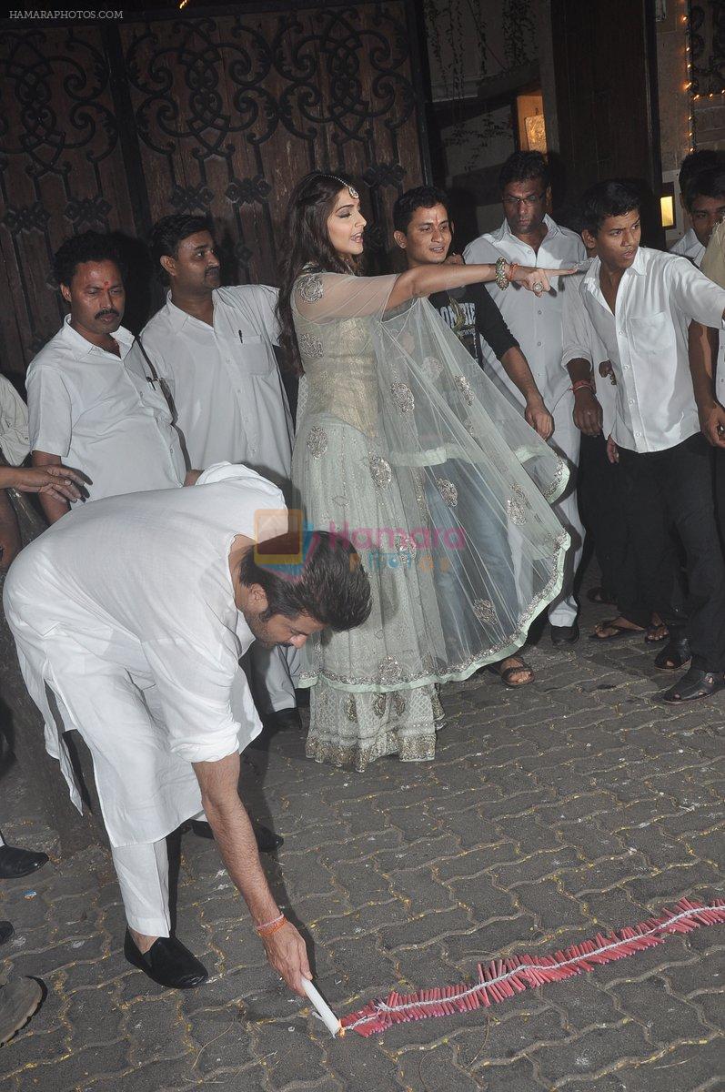 Anil Kapoor, Sonam Kapoor snapped celebrating Diwali in Mumbai on 23rd Oct 2014