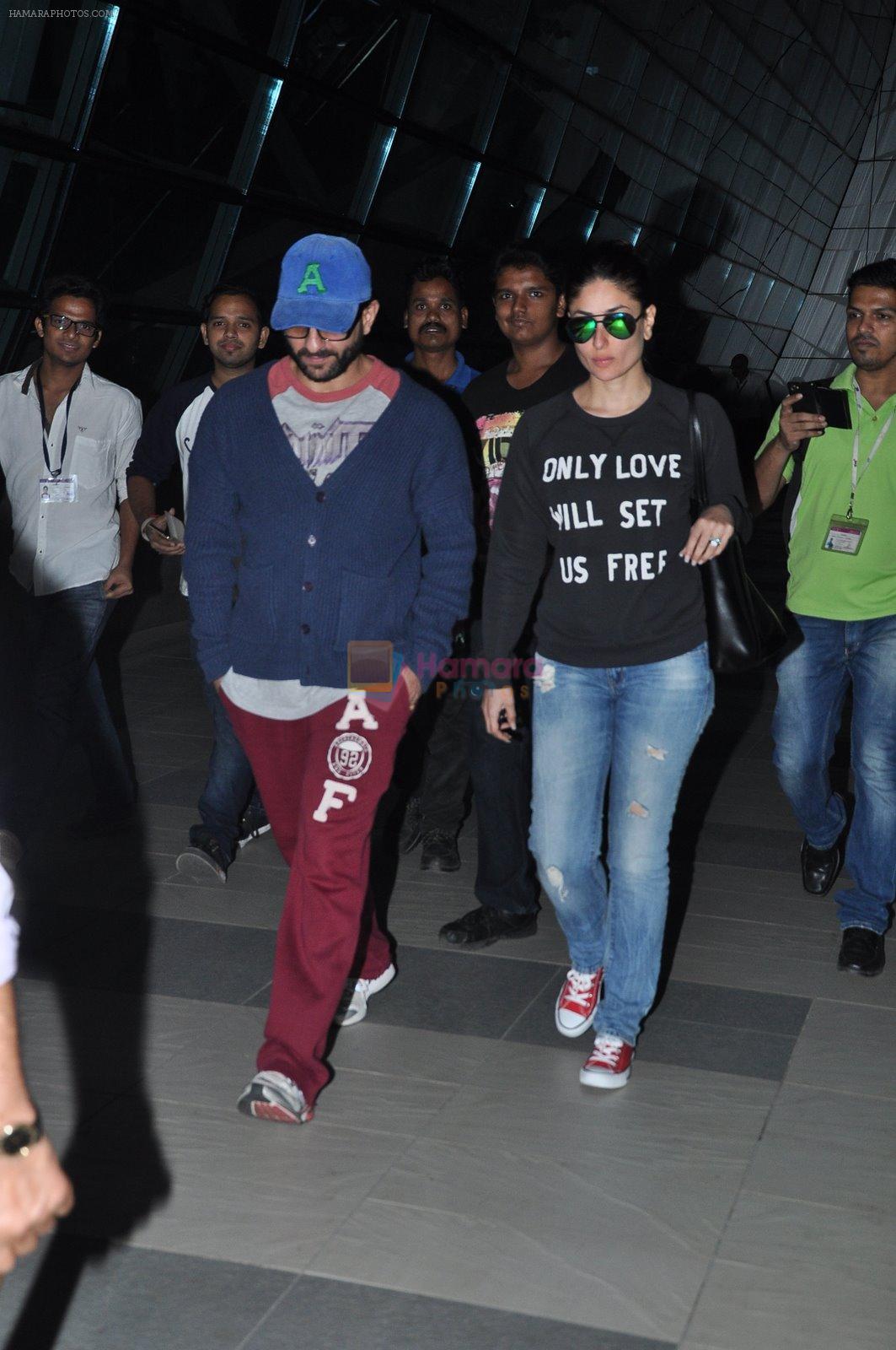 Kareena Kapoor, Saif Ali Khan snapped in Mumbai Airport on 21st Nov 2014