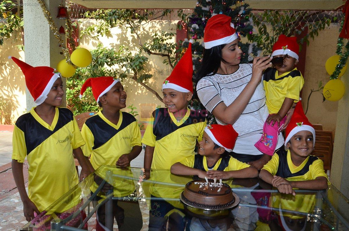 Shriya Saran spreads christmas joy with Access Life NGO Kids in Chembur, Mumbai on 23rd Dec 2014