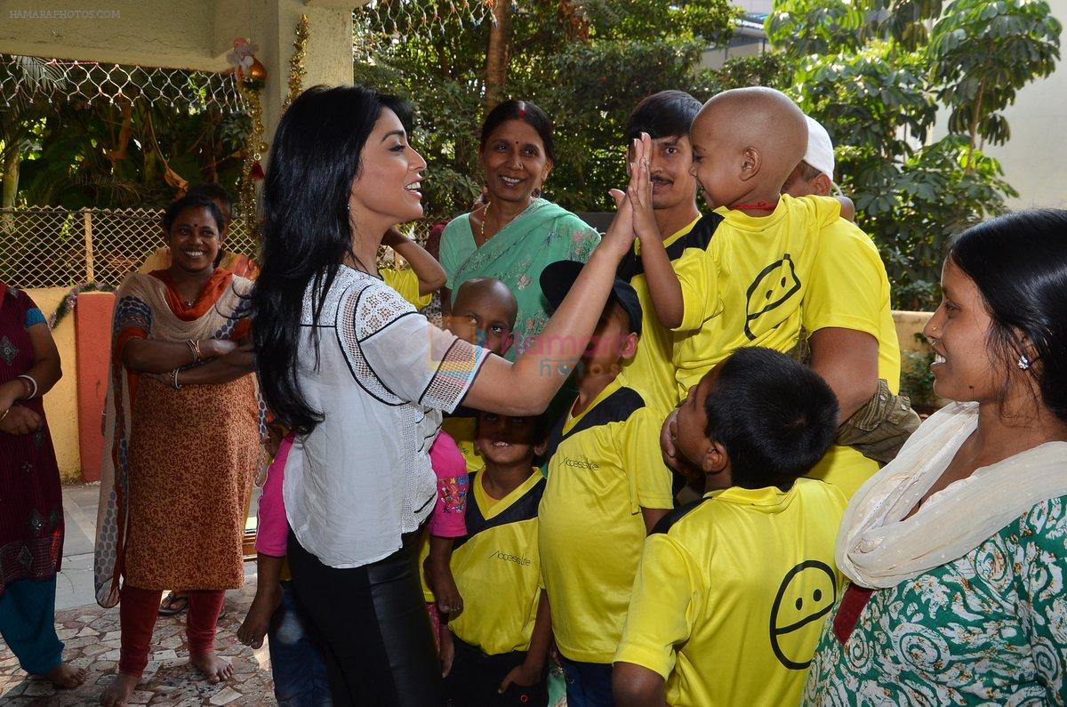 Shriya Saran spreads christmas joy with Access Life NGO Kids in Chembur, Mumbai on 23rd Dec 2014
