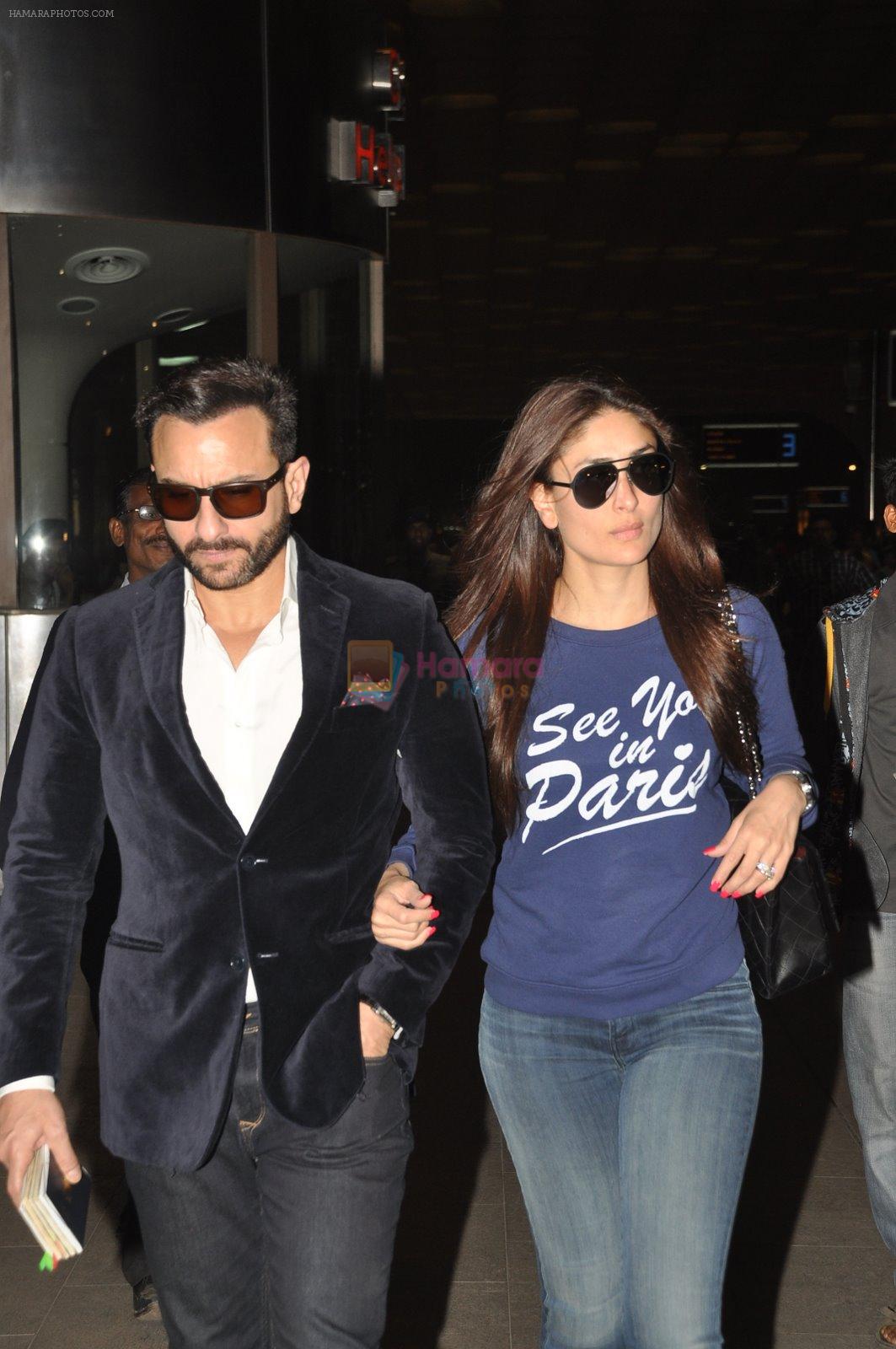 Kareena Kapoor and Saif Ali Khan snapped at airport on 25th Dec 2014