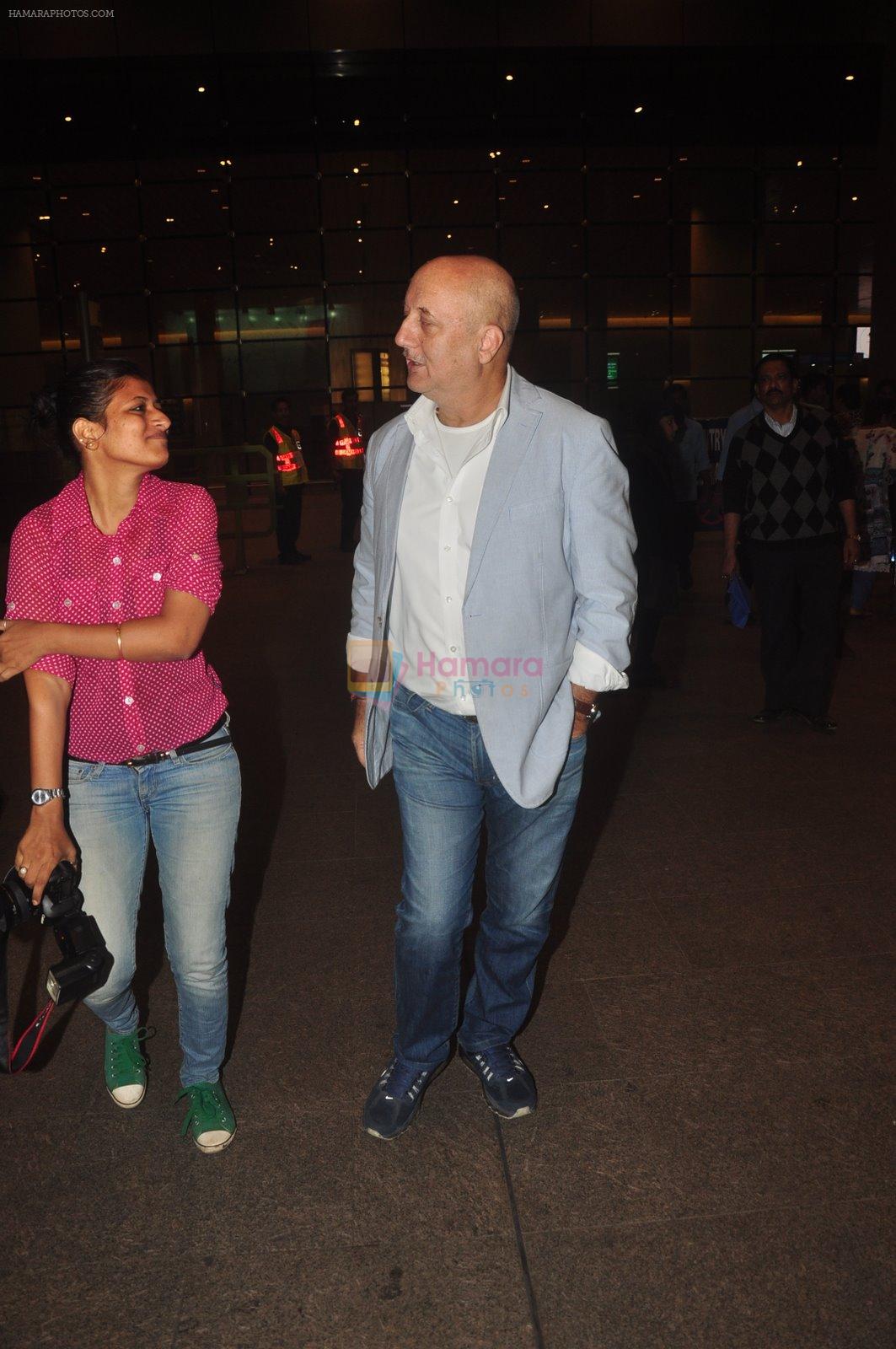 Anupam Kher snapped at airport in Mumbai on 2nd Jan 2015