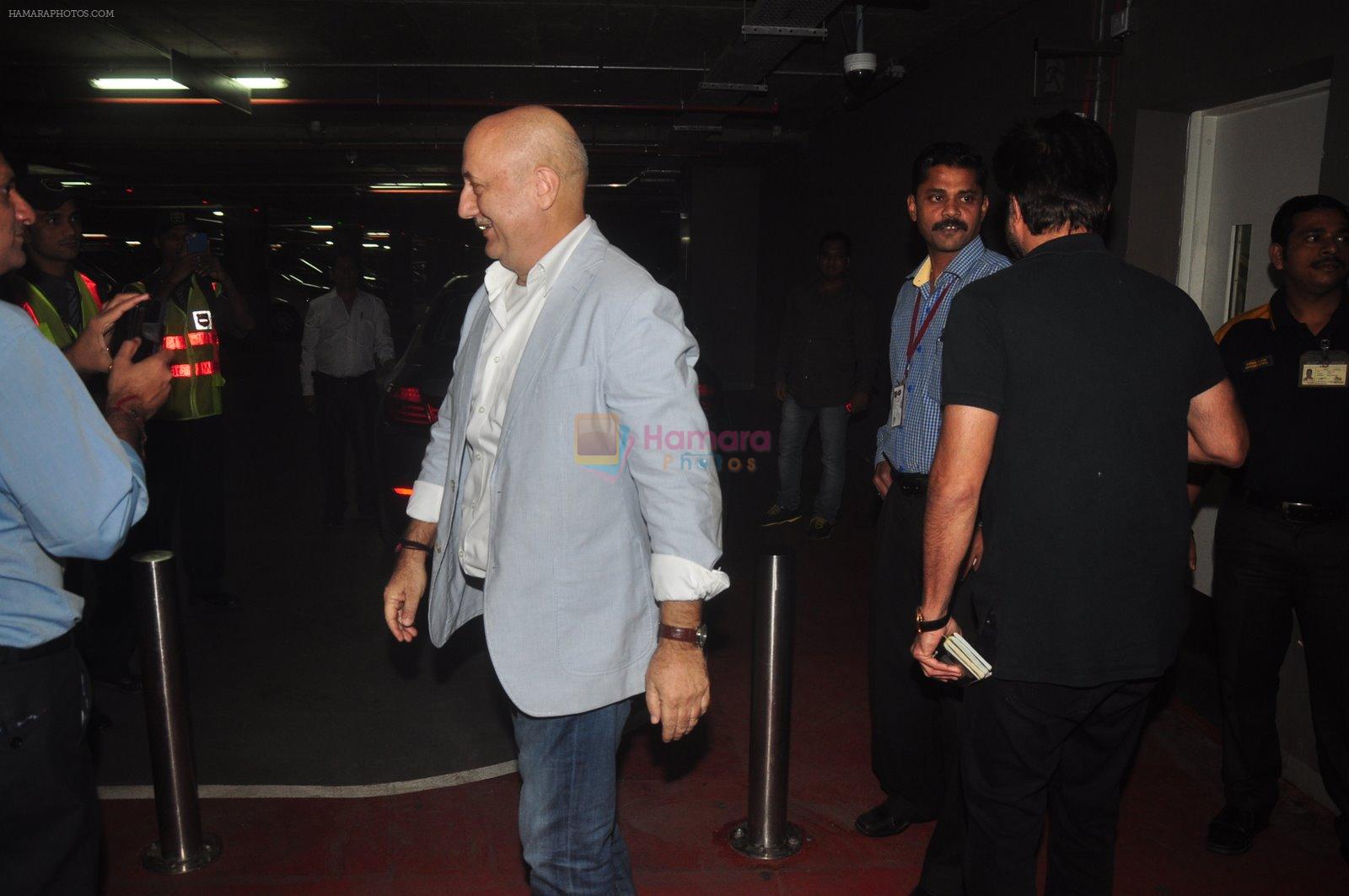 Anil Kapoor, Anupam Kher snapped at airport in Mumbai on 2nd Jan 2015