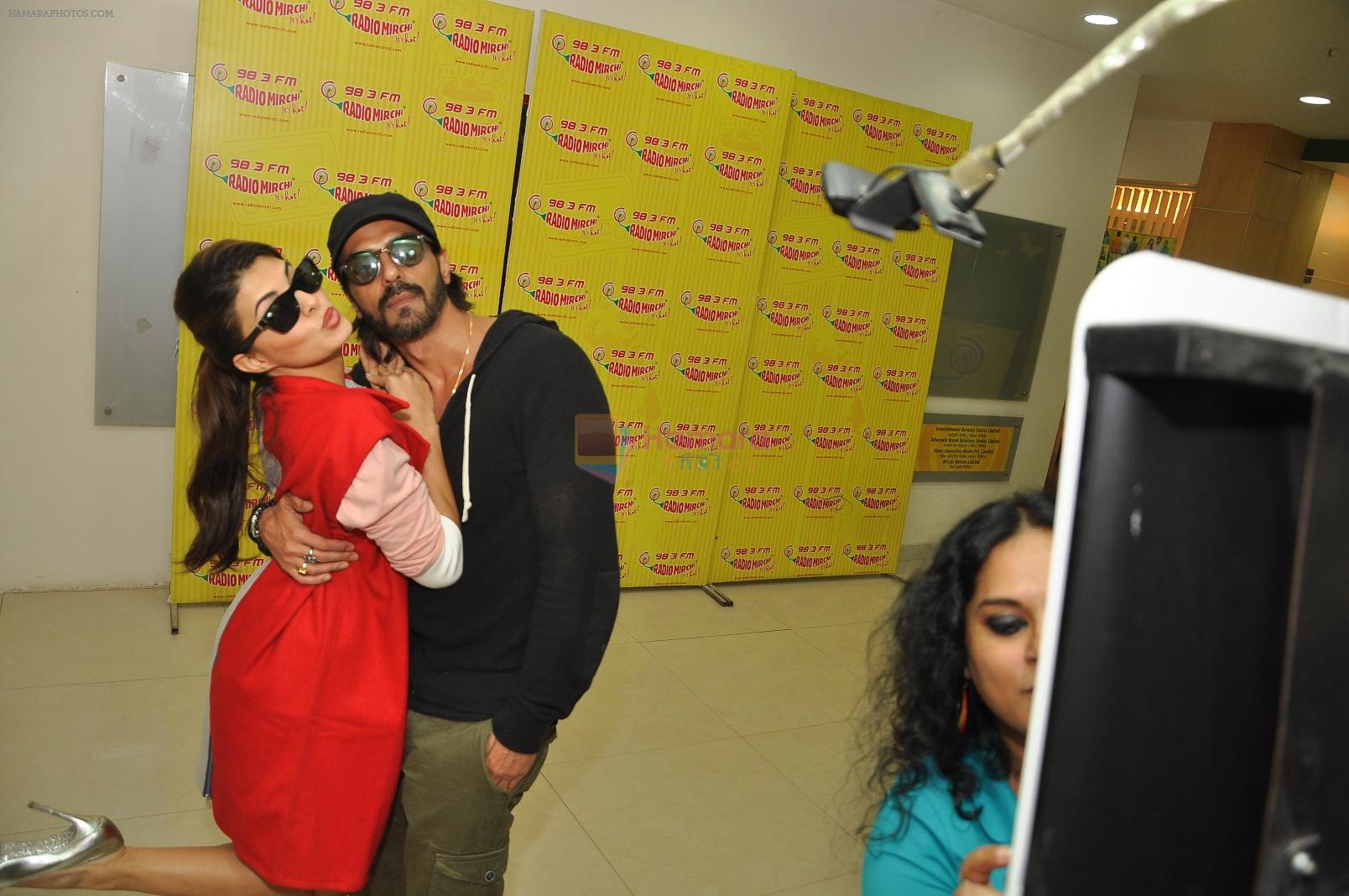 Jacqueline Fernandez & Arjun Rampal pose for a selfie at Radio Mirchi Mumbai studio for the promotion of Roy