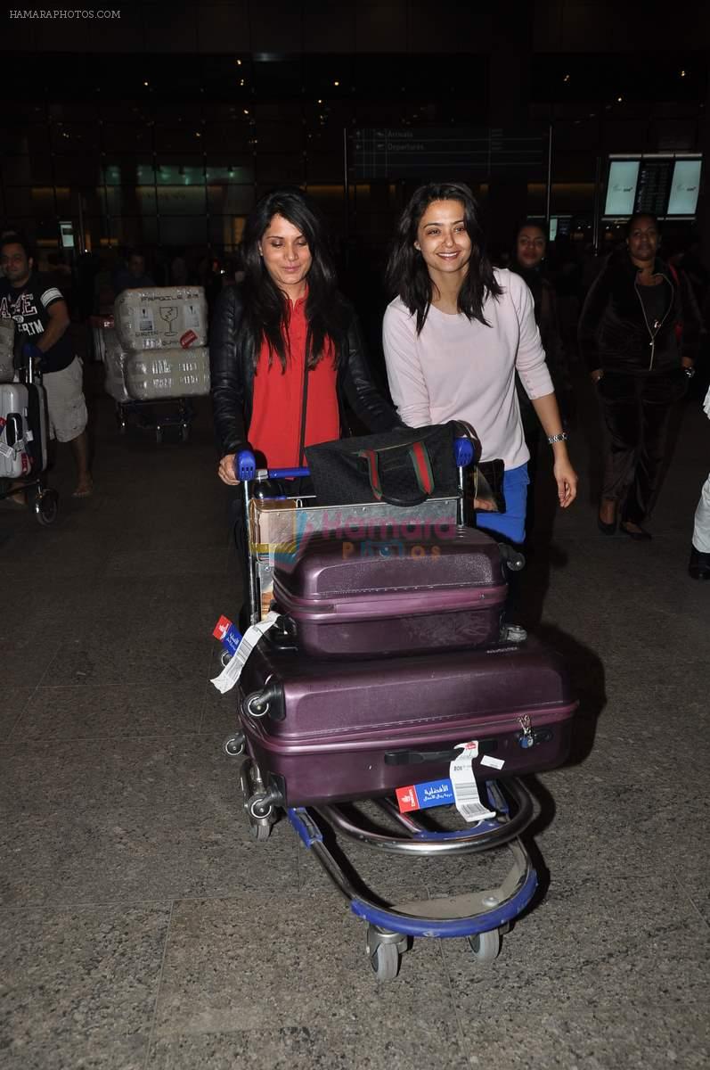 Richa Chadda, Surveen Chawla snapped at the airport in Mumbai on 13th Jan 2015