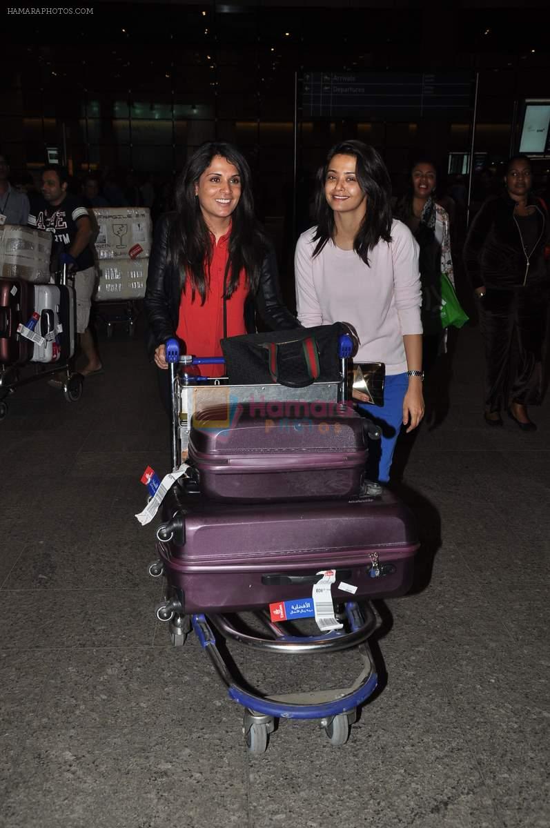 Richa Chadda, Surveen Chawla snapped at the airport in Mumbai on 13th Jan 2015