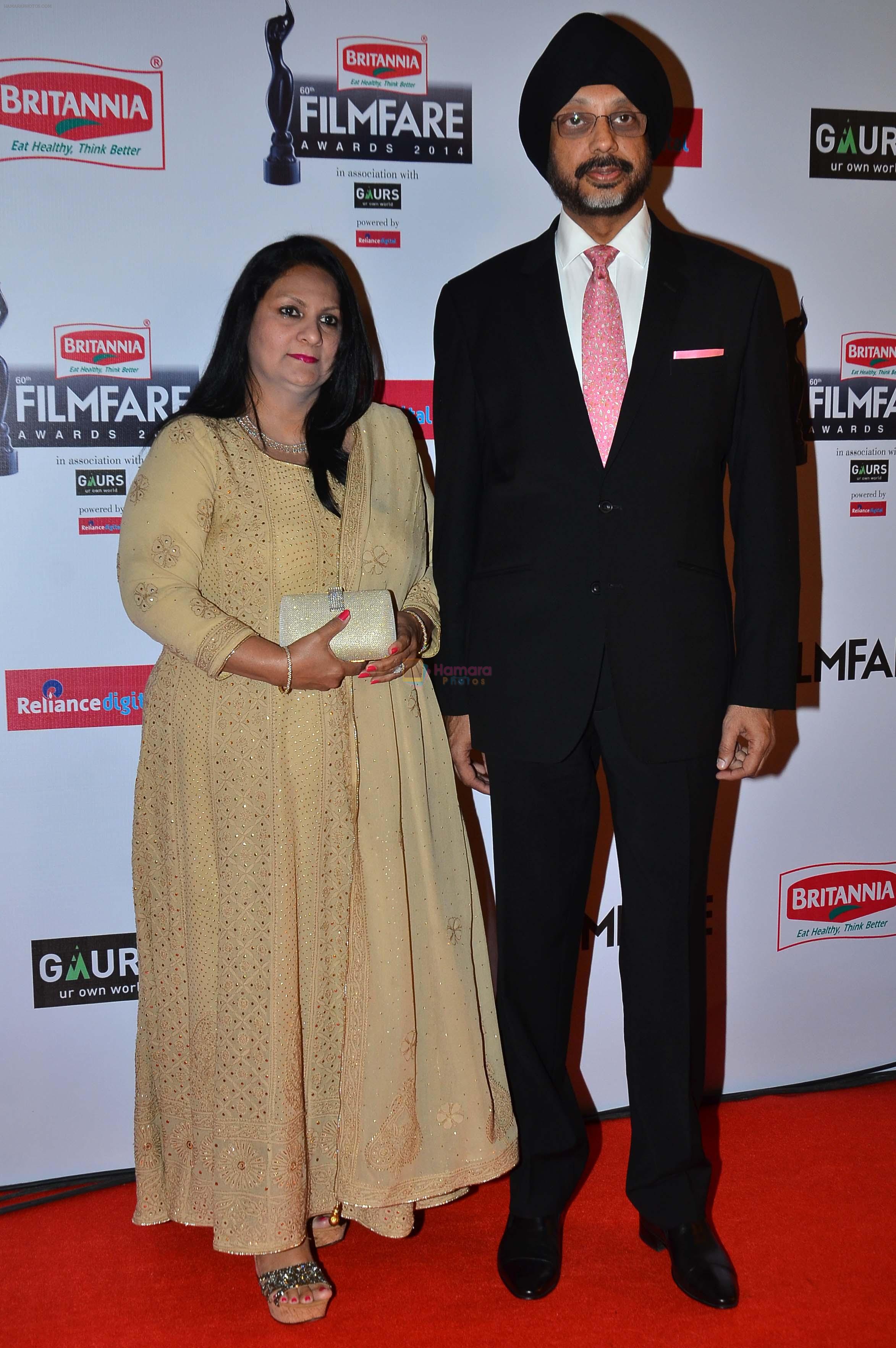 NP Singh with wife graces the red carpet at the 60th Britannia Filmfare Awards