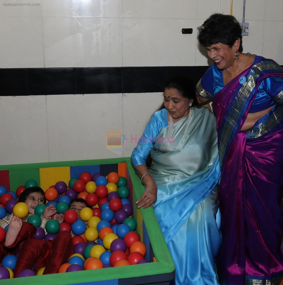Asha Bhosle and Dr.Anjali Morris with kids at the inauguration of Small Steps Morris Autism and Child Development Centre at Deenanath Mangeshkar Hospital