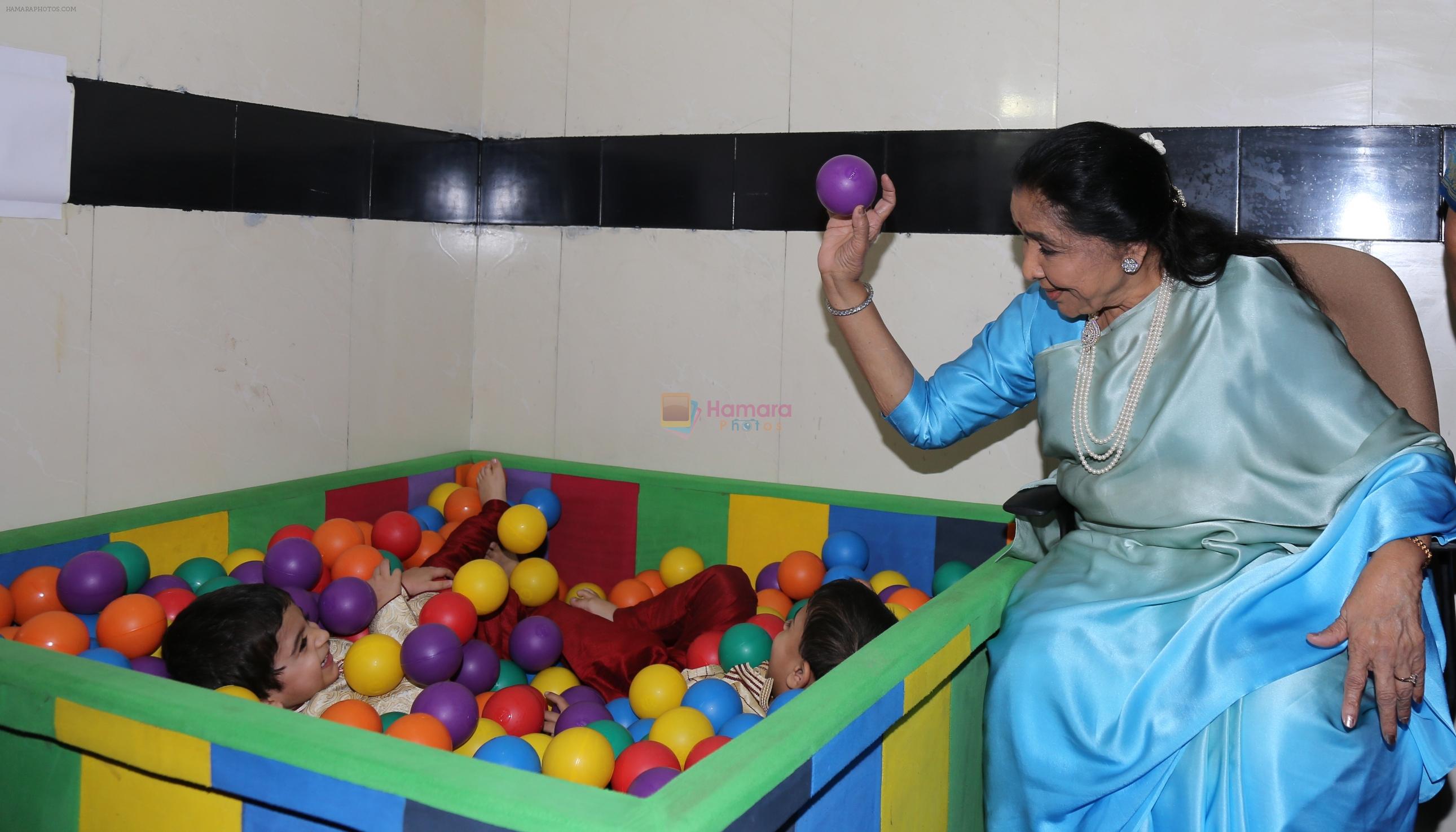 Asha Bhosle shares a moment with kids at the inauguration of Small Steps Morris Autism and Child Development Centre at Deenanath Mangeshkar Hospital