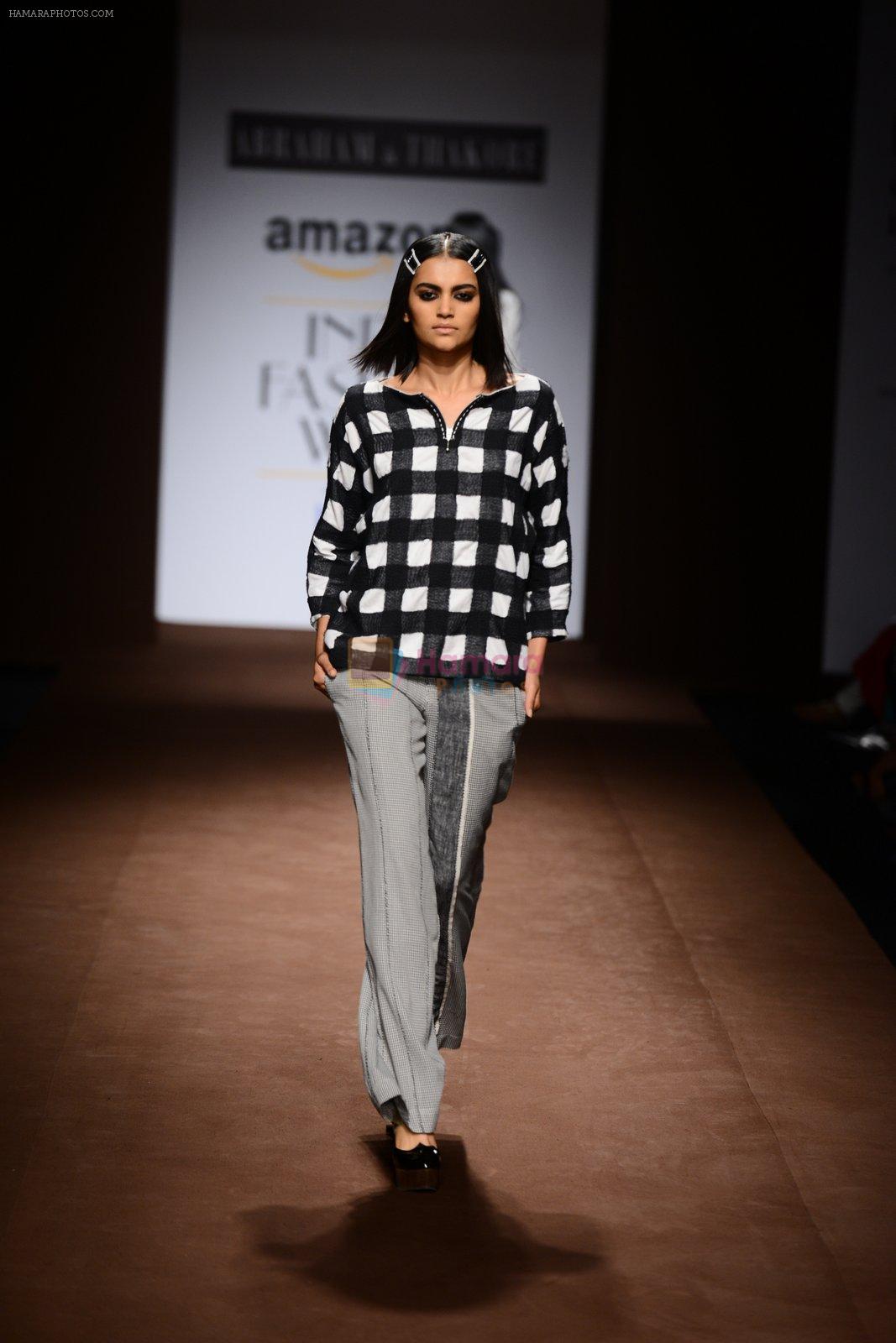 Model walk the ramp for Abraham Thakore on day 2 of Amazon India Fashion Week on 26th March 2015
