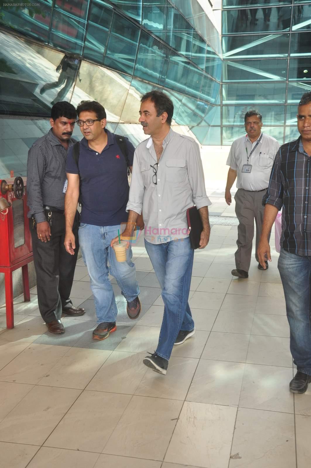 Rajkumar Hirani snapped at airport with Jerry Pinto's Helen book and candy bag on 23rd April 2015