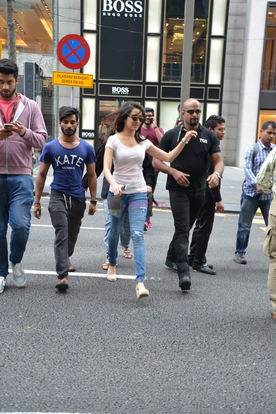 Shraddha Kapoor almost stopped traffic as she stops cars passing while she crosses in KL, Malaysia on 11th June 2015