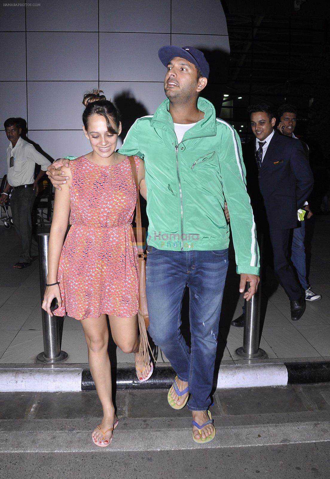 Yuvraj Singh and Hazel Keech post their engagement snapped at the airport on 17th Nov 2015